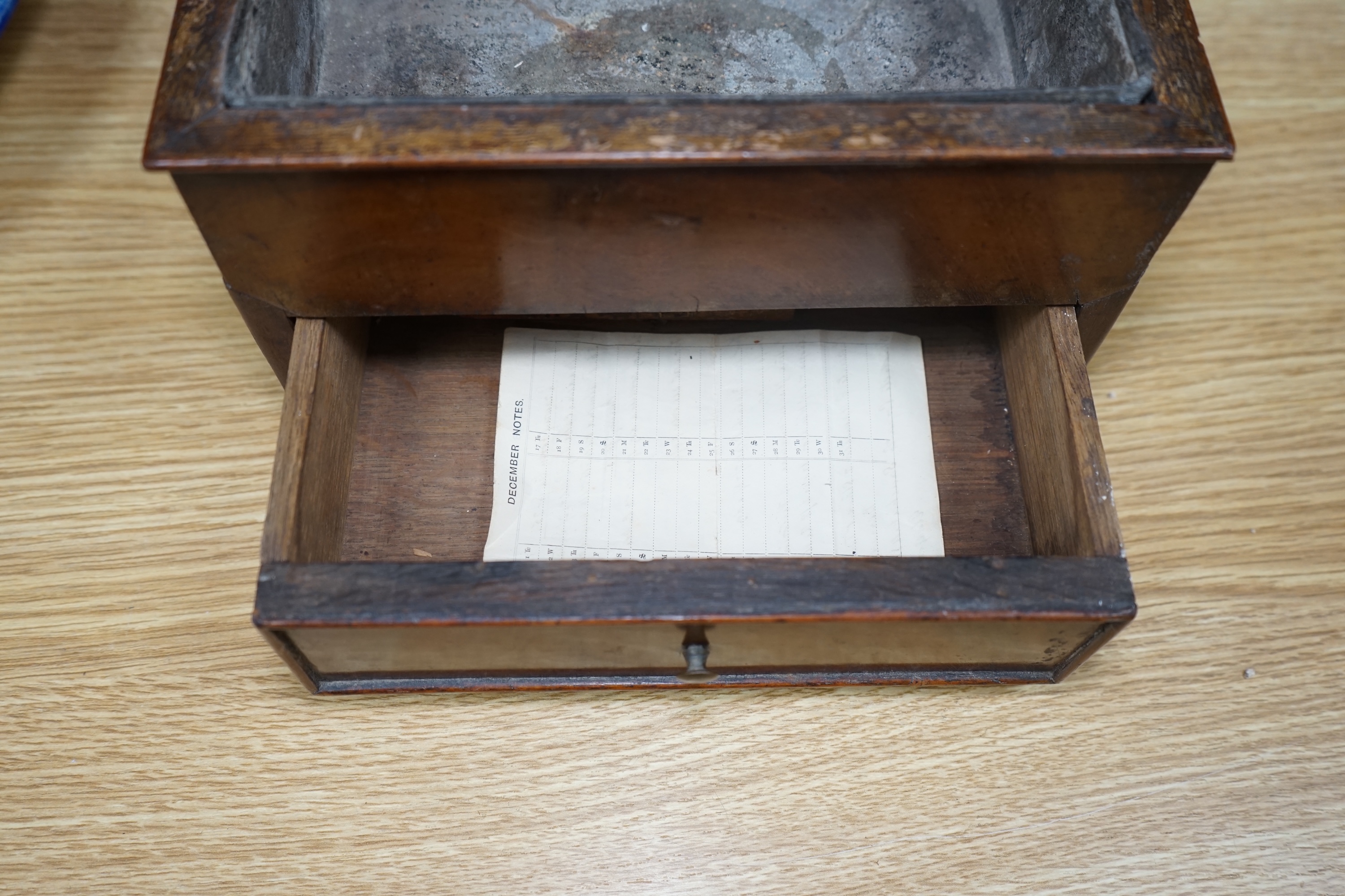 A rare Regency mahogany clay pipe stand, the lyre shaped back over a tobacco draw, 45cm tall. Condition - poor